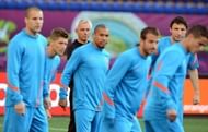 Dutch coach Bert van Marwijk (3rd L) is approaching the Oranje's match in Kharkiv with caution